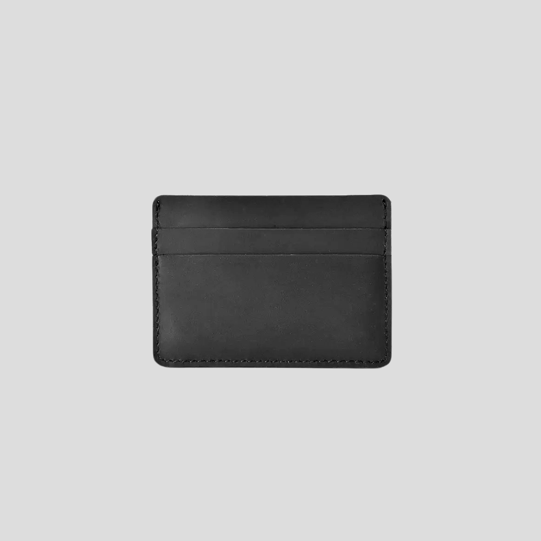 Black leather card holder for men showing slim profile and premium leather texture, perfect gifts for boyfriend and husband
